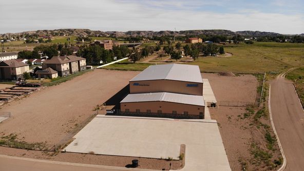 Functional +/-18,000+ SQ FT Shop on 3.11 Acres in Glendive, MT: 123 W Oregon Ln, Glendive, MT 59330